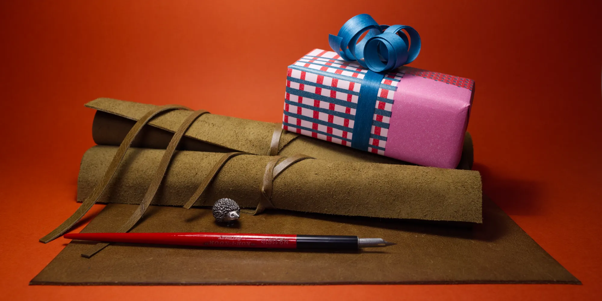 a leather calligraphy writing pad